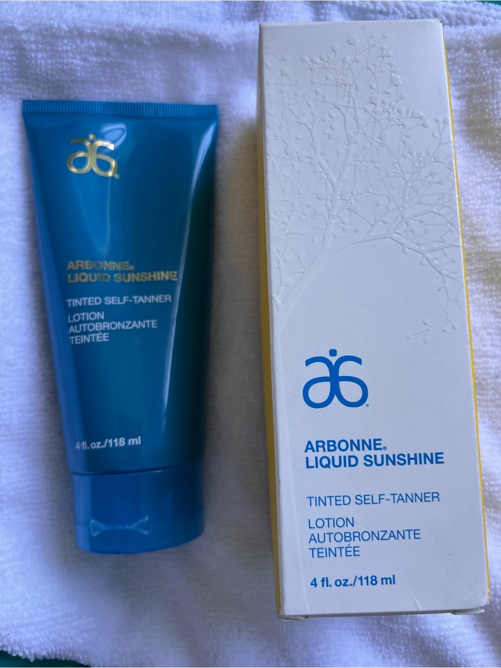 Arbonne Liquid Sunshine Tinted Self-Tanner Lotion - Blue & White